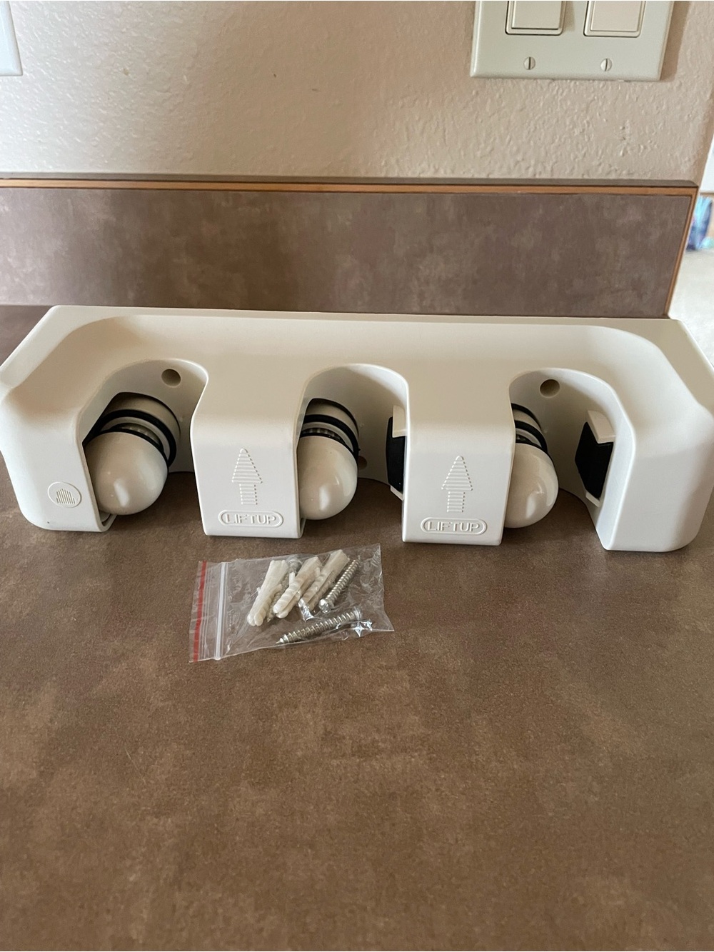 Broom and mop holder